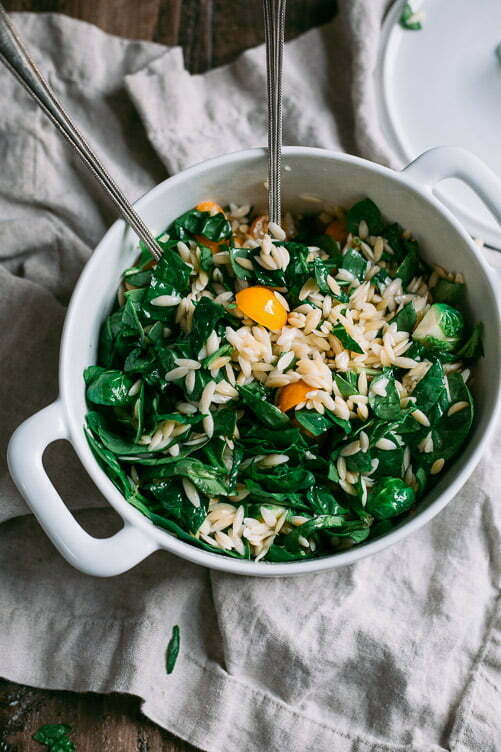 Healthy Mediterranean Salad with Spinach, Cherry Tomatoes, Olives and Orzo